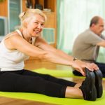 Mature couple doing exercises